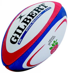 A red, blue, and white Gilbert rugby ball with the England Rugby rose logo and Official Replica Ball text printed on it.
