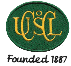 An embroidered green oval patch with yellow intertwined letters USCL and the words Founded 1887 written in black script below.