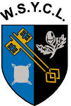 A shield divided into blue and black halves with two crossed gold keys, a white acorn with leaves, and a white square cushion. The initials W.S.Y.C.L. appear above the shield.