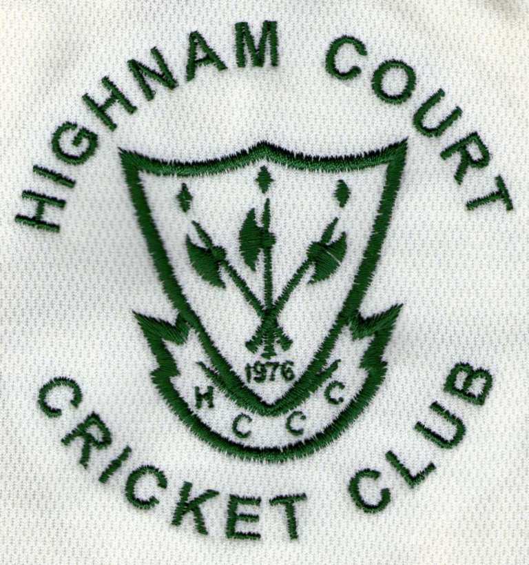 Embroidered Highnam Court Cricket Club logo featuring crossed cricket bats, stumps, and the year 1976 on a white textured fabric background. The club name circles the crest.