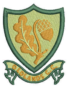 An embroidered crest featuring an oak leaf and acorn on a green shield, with a banner below that reads OLDLANDS C.C.