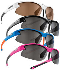 Four pairs of sporty wraparound sunglasses in white, black, blue, and pink with dark lenses, stacked diagonally against a white background.