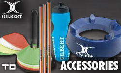 A selection of Gilbert rugby accessories including marker cones, training poles, a blue water bottle, and a blue kicking tee, with GILBERT and ACCESSORIES text.