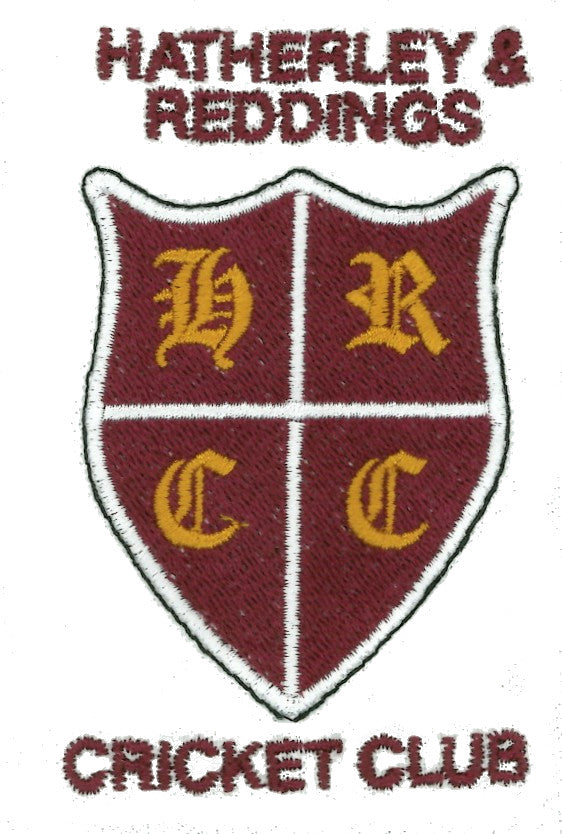 Embroidered maroon and gold shield logo for Hatherley & Reddings Cricket Club, with the initials HRCC and club name above and below the shield.