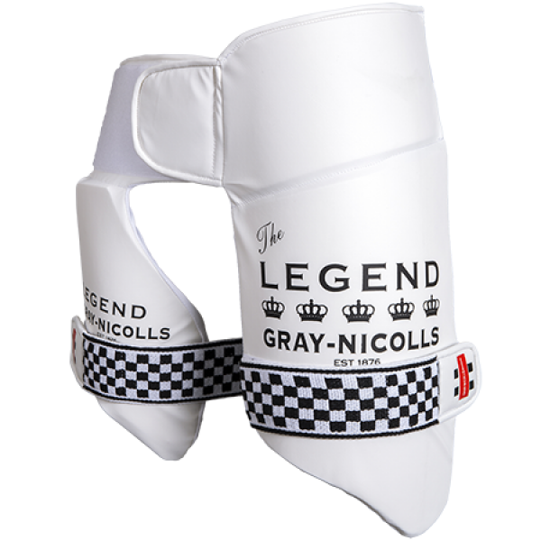 White cricket thigh pad with The Legend Gray-Nicolls and crown logos printed on it, featuring a black-and-white checkered strap for securing the pad.