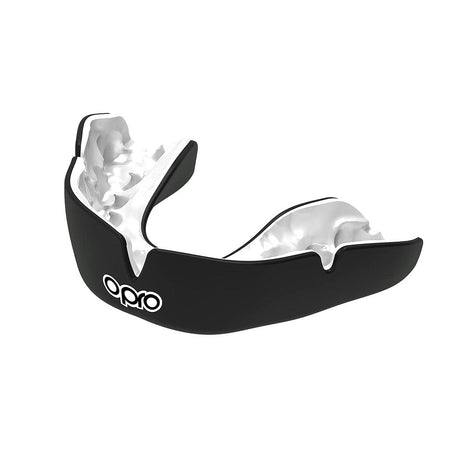 The OPRO Instant Custom Self Fit Mouthguard in Black/White features the Opro logo on the front, displayed on a white background. This mouthguard provides athletes with reliable protection during intense play.