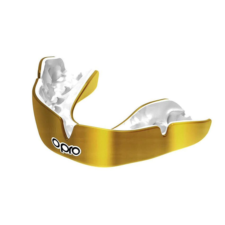 The OPRO Instant Custom Self Fit Mouthguard by Opro is shown in Gold/White with the Opro logo on the front, set against a plain white background.
