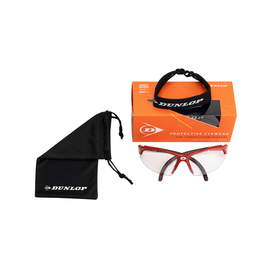 Dunlop Squash Eyewear - Competition Players: red and clear junior goggles with eye protection and adjustable strap, shown with a black pouch and orange Dunlop box, all on a white background.