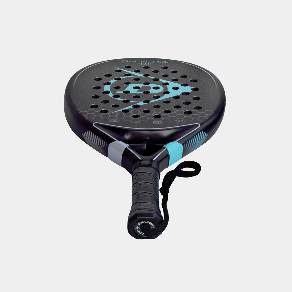 The Dunlop Galactica Team Padel Racket by Dunlop, in black and turquoise, features a perforated round head, Tri-Max reinforcement, wrapped grip for superior hold, and wrist strap. Displayed on a light grey background.