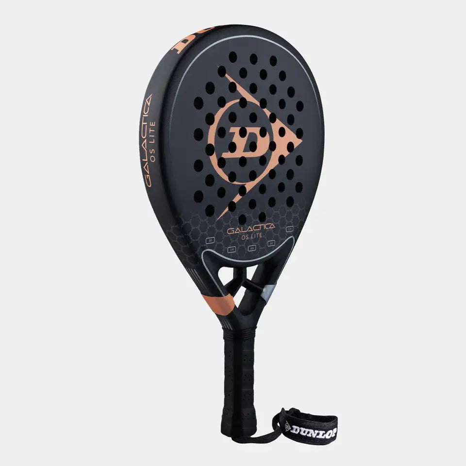 The Dunlop Galactica OS Lite Padel Racket by Dunlop features black 3K Carbon with bronze details, a honeycomb pattern, circular holes, Tri-Max reinforcement for strength and control, and a wrist strap. Displayed on a white background.