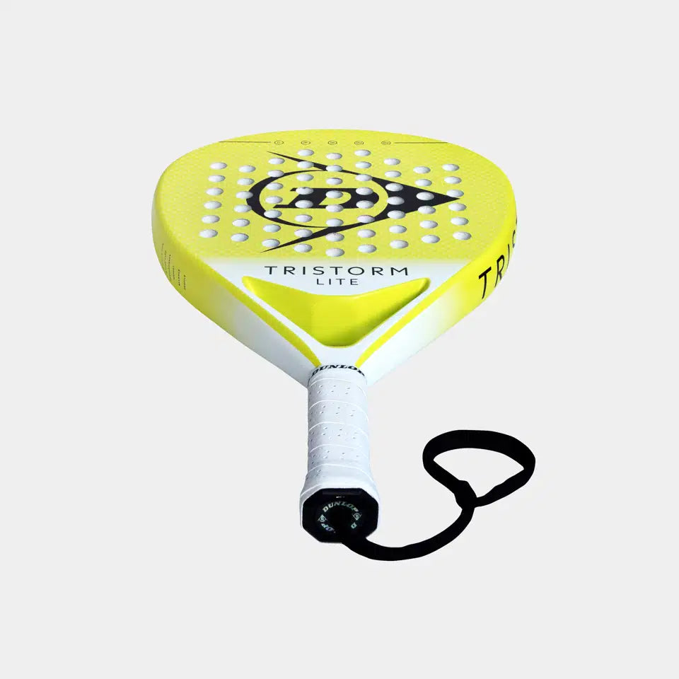 A Dunlop Tristorm Lite Padel Racket with a yellow and white design, perforated face, black Dunlop logo, TRISTORM LITE label, graphite build, white handle, and black wrist strap is shown against a plain light background.