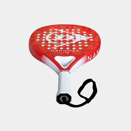 The Dunlop Nanomax Lite Padel Racket features a graphite frame, red and white design, circular hole pattern, white grip, and black wrist strap, shown against a plain light background.