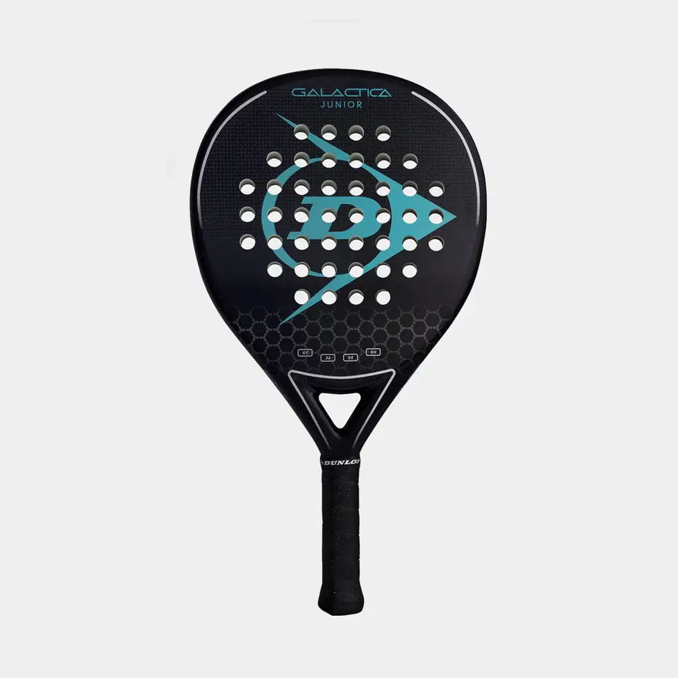 The Dunlop Galactica Junior Padel Racket features a black design with teal accents, a graphite frame, central circular holes, and a hexagonal lower face pattern, shown on a plain light background.
