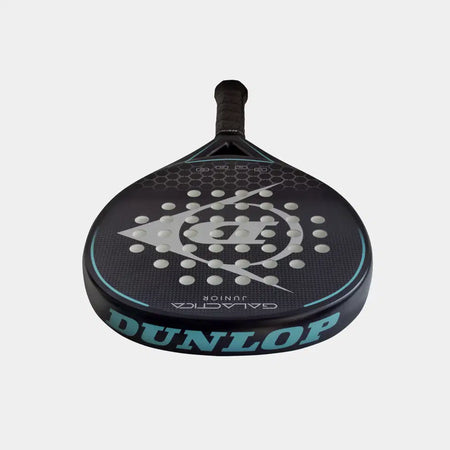 The Dunlop Galatica Junior Padel Racket features a black design with blue accents, a graphite frame, perforated face, and honeycomb pattern. Large blue Dunlop branding is printed on the side.