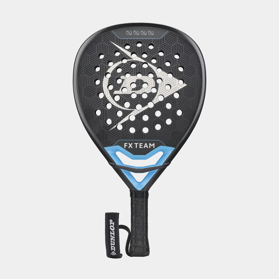 The Dunlop FX Team Padel Racket by Dunlop features SpinBoost technology, a blue accent near the throat, circular holes on its black face, and a wrist strap on the handle, shown against a plain light background.