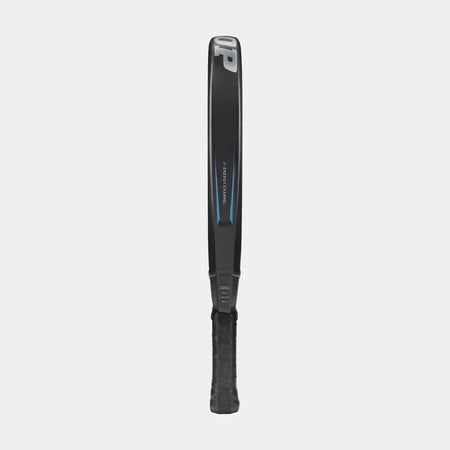 A black Dunlop FX Team Padel Racket shown from the side, featuring a thin frame, visible grip, subtle blue accents, Force Bridge technology, and Dunlop branding on the frame.