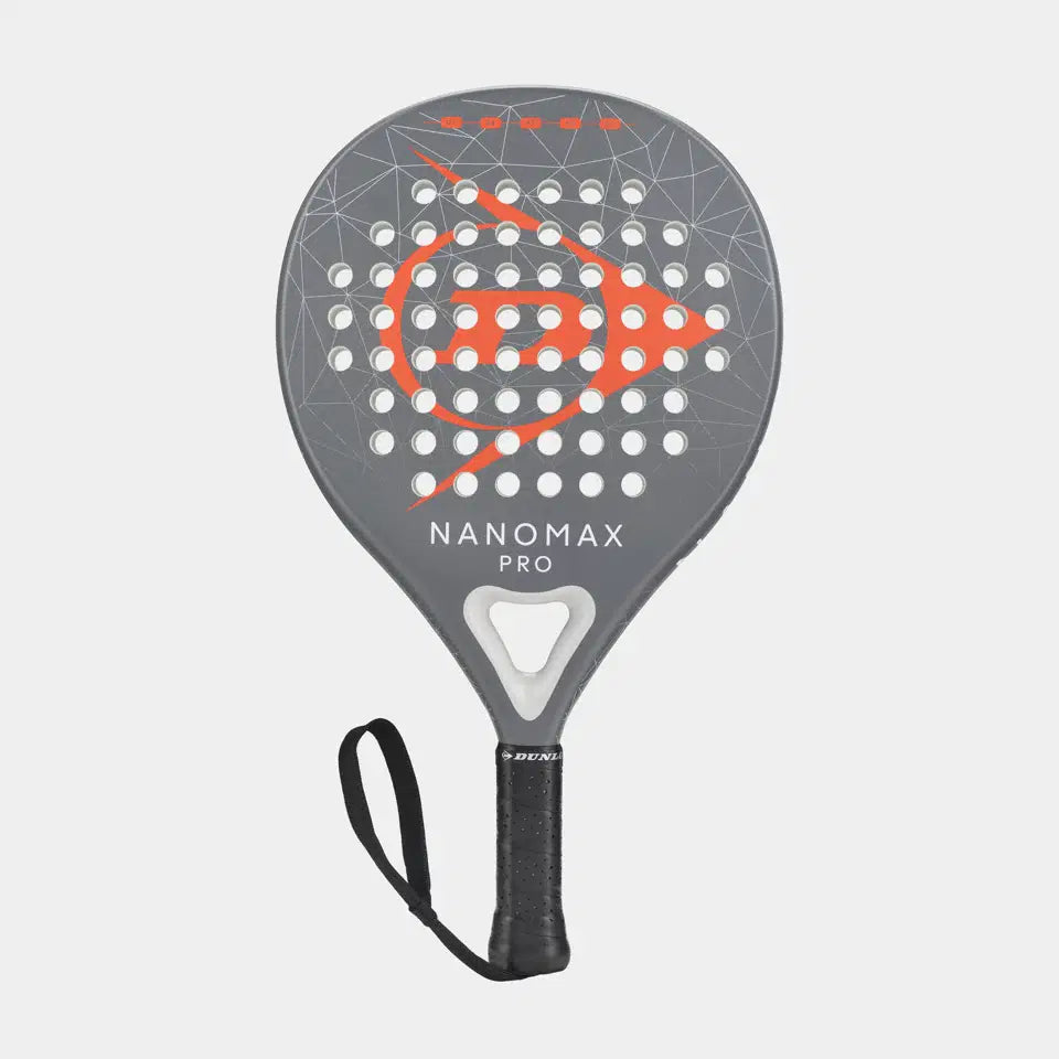 The Dunlop Nanomax Pro Padel Racket features a gray and black design with orange geometric accents, a graphite frame, "NANOMAX PRO" on the face, a Pro EVA core for comfort, and a black wrist strap on the handle.