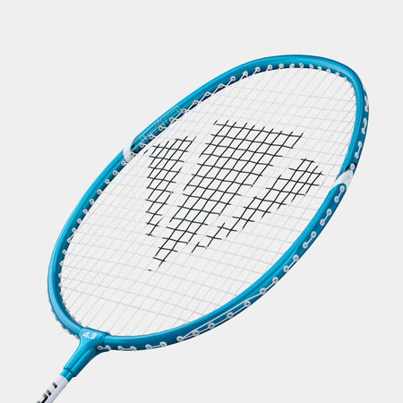 A close-up of the Carlton Maxi-Blade ISO 4.3 Badminton Racket, featuring a blue lightweight frame, white strings, and a black geometric logo at the center, set against a plain white background.