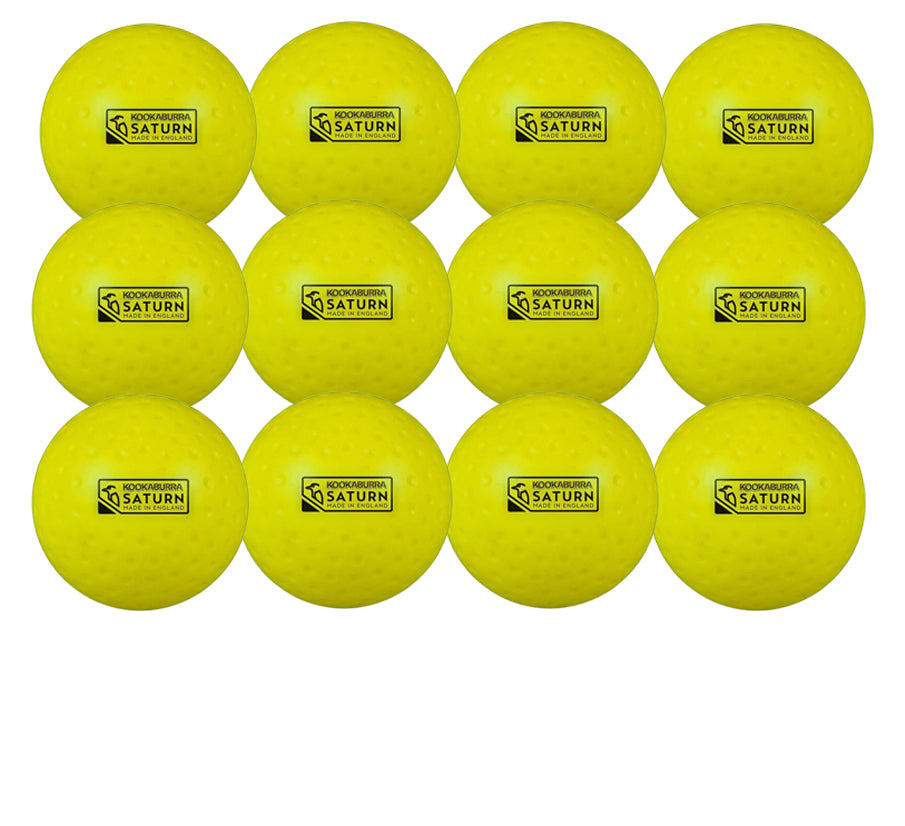Twelve Kookaburra Dimple Saturn Hockey Balls (yellow, 12 pack) are arranged in a grid. Each practice ball displays the black Kookaburra logo and KOOKABURRA SATURN label on a white background.