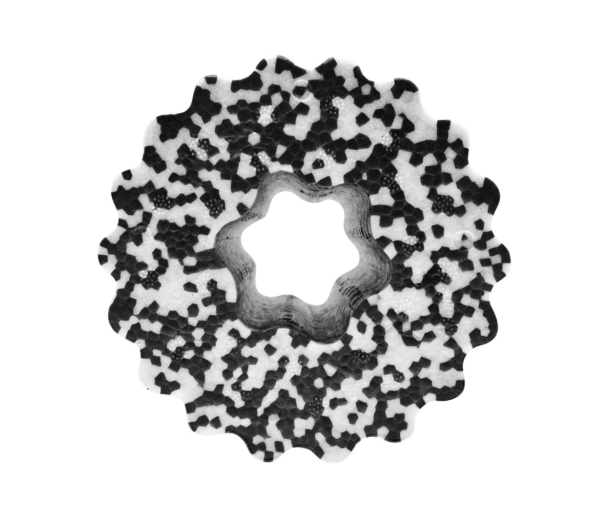 The Urban Fitness Foam Massage Roller by Urban Fitness features a circular, gear-shaped design with a wavy-edged center and a white surface patterned with black spots—perfect for muscle recovery and deep tissue relief.