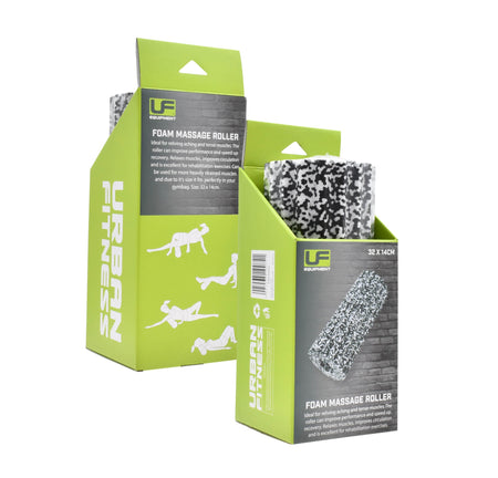 Two green Urban Fitness Foam Massage Roller boxes show partially visible black and white speckled high-density rollers inside, with white exercise illustrations on the packaging highlighting deep tissue relief.