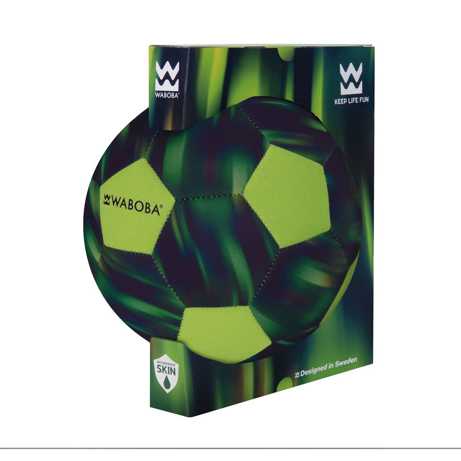 A green and black Waboba Beach Soccer Ball (size 3) is shown partly inside its box, which displays the Waboba logo, the "Keep Life Fun" slogan, and green abstract designs.