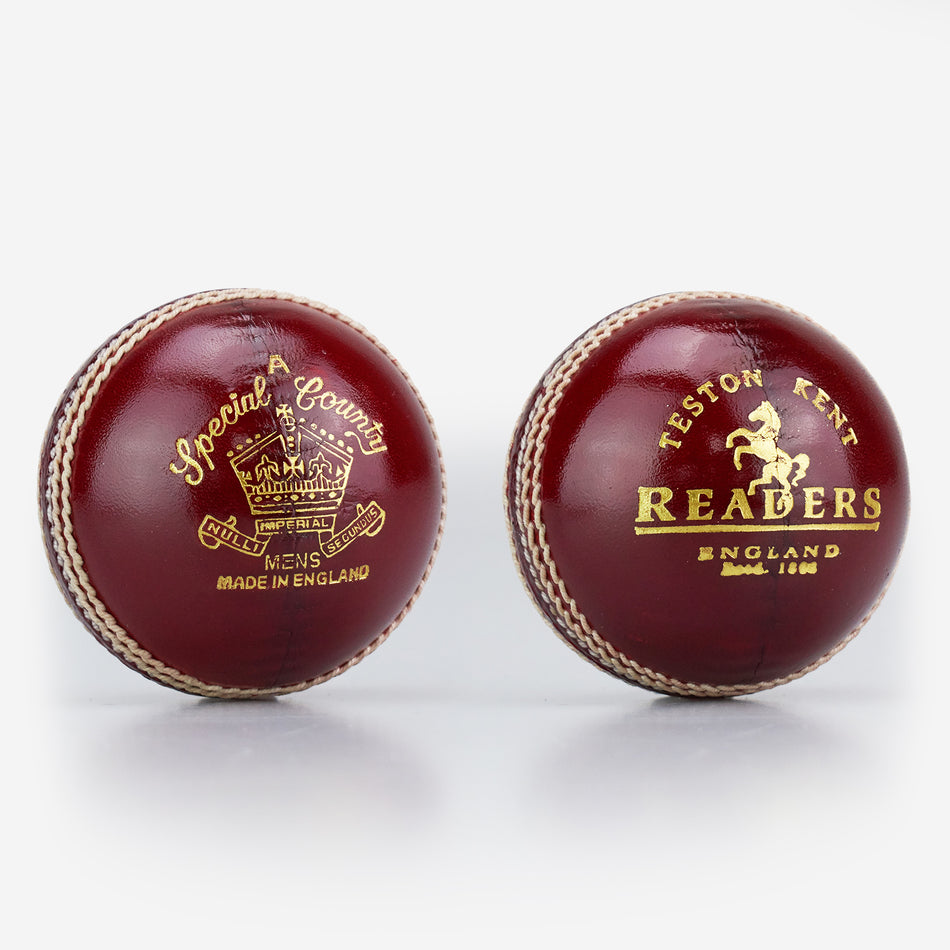 Two Readers Special County Imperial Crown cricket balls in brown leather with gold embossed logos, white stitching, and a glossy finish—ideal for Premier League cricket—are shown against a white background.