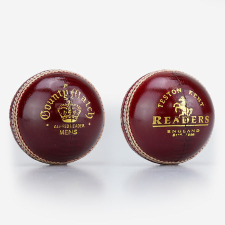 Two dark red Readers leather cricket balls with gold text. The left is a Readers County Match Cricket Ball; the right reads "Teston Kent, Readers, England, Estd. 1808.