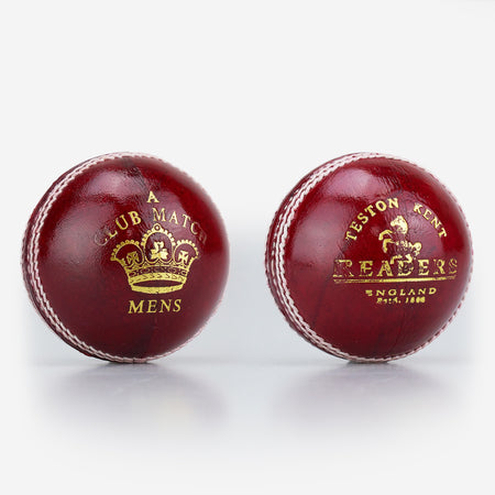 Two red Readers Club Match cricket balls made from imported leather with white stitching; one reads "A Club Match Mens" and features a gold crown, the other says "Teston Kent Readers England Est. 1808" in gold text with a crown.