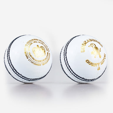 Two white Kookaburra County Match Cricket Balls from Kookaburra are placed side by side on a plain white background.
