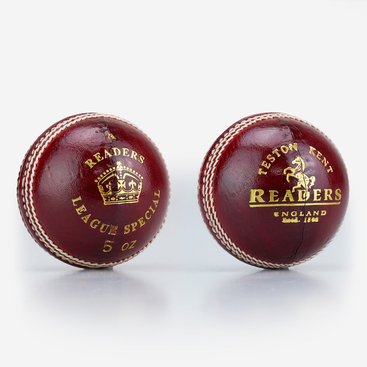 Two red leather, hand-stitched Readers women's cricket balls with gold detailing: one features "Readers League Special 5 oz" with a crown, the other has "Teston Kent Readers England" with a horse and company details. Suitable for women's cricket.