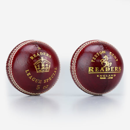 Two red leather, hand-stitched Readers women's cricket balls with gold detailing: one features "Readers League Special 5 oz" with a crown, the other has "Teston Kent Readers England" with a horse and company details. Suitable for women's cricket.