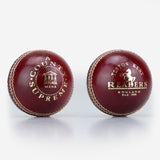 Two red leather Readers County Supreme A cricket balls, each with white hand stitching and gold embossed text and logos reading "Readers, Teston Kent, England, Estd. 1808.
