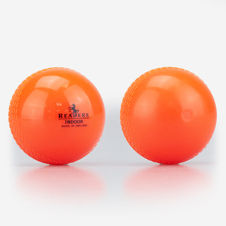Two orange Readers Indoor 4oz Cricket Balls, one with the "Readers Indoor Made in England" logo and one plain, both with textured seams; ideal for coaching and shown on a white background.