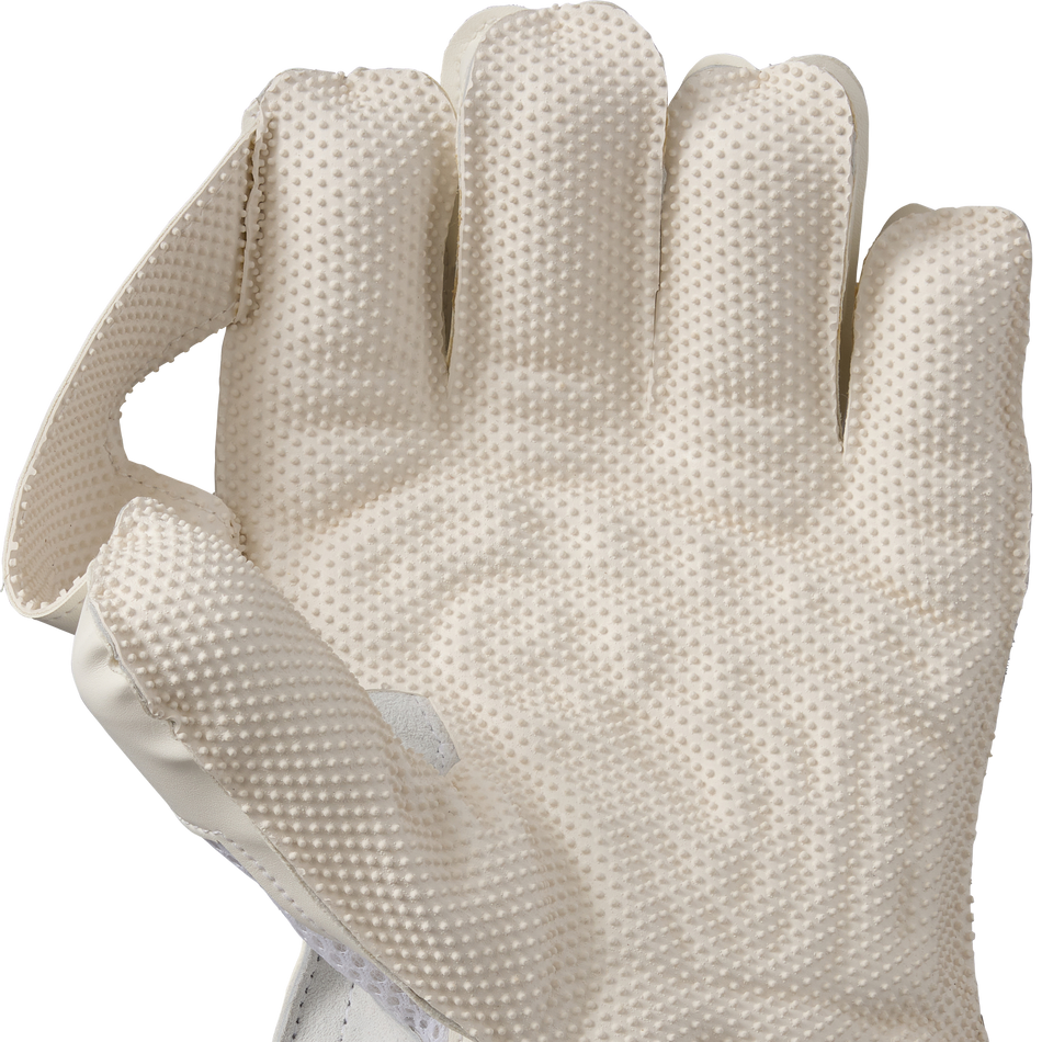 A close-up of the Gunn & Moore 606 Wicket Keeping Gloves 2026 by Gunn & Moore, featuring a beige pimple rubber palm with a dotted texture, palm side visible, and part of the thumb bent inward.