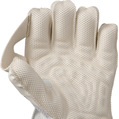 A close-up of the Gunn & Moore 606 Wicket Keeping Gloves 2026 by Gunn & Moore, featuring a beige pimple rubber palm with a dotted texture, palm side visible, and part of the thumb bent inward.