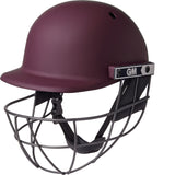 The Gunn & Moore Maestro Edge Cricket Helmet in maroon features a metal faceguard, chin strap, breathable design, and the GM logo, providing superior impact protection for players.