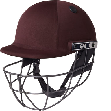The Gunn & Moore Maestro Cricket Helmet in maroon features a high-strength steel grille, adjustable chin strap, and black GM logo plate on the side. Shown against a white background.