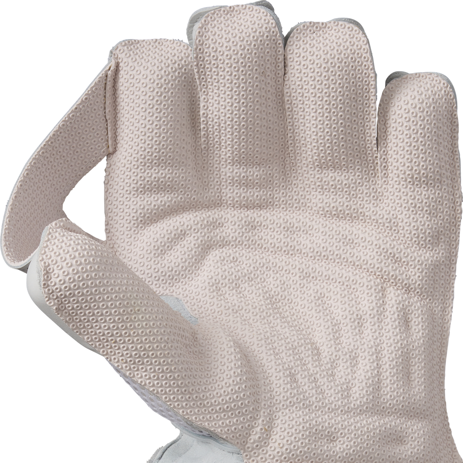 A close-up of Gunn & Moore Original Wicket Keeping Gloves 2026, featuring a textured, light-colored design with raised dots for high-impact protection, held open against a plain white background.