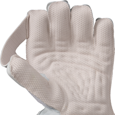 A close-up of Gunn & Moore Original Wicket Keeping Gloves 2026, featuring a textured, light-colored design with raised dots for high-impact protection, held open against a plain white background.