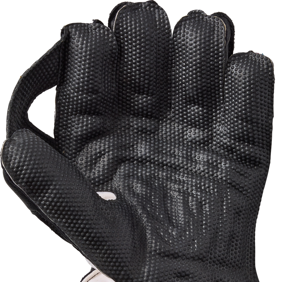 A close-up of the Gunn & Moore Rival Wicket Keeping Gloves 2026 shows a textured black surface with raised grip dots, pimple rubber palm for superior grip and protection, full-finger coverage, partial thumb protection, and a padded cuff.