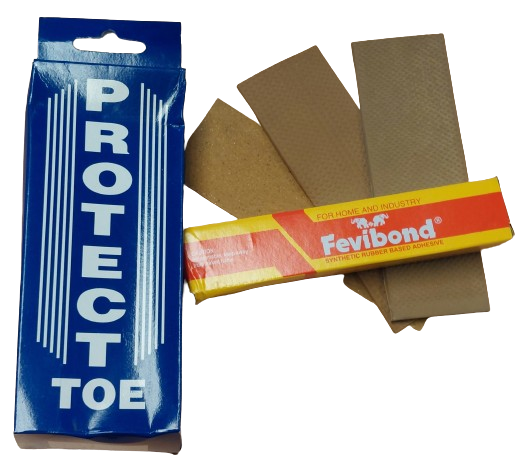 A blue Hunts County Toe Guard Protector Kit box stands next to a yellow and red Fevibond adhesive box and several brown patches, resembling a DIY kit for toe protection like the Hunts County Toe Guard Protector.