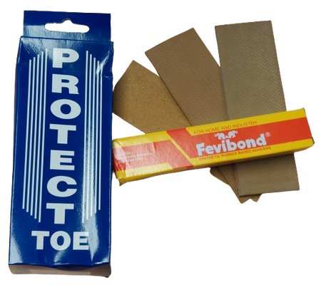 A blue Hunts County Toe Guard Protector Kit box stands next to a yellow and red Fevibond adhesive box and several brown patches, resembling a DIY kit for toe protection like the Hunts County Toe Guard Protector.