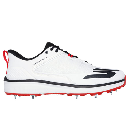 The Skechers Cricket Elite Cricket Shoe by Skechers features a white upper with black and red accents, black laces, a red heel pull tab, a red outsole with metal spikes, and an Arch Fit insole. Displayed in side profile on a white background.