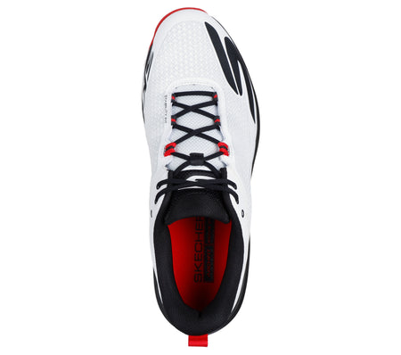 Top view of the Skechers Cricket Elite Cricket Shoe in white with black laces, black and red accents, breathable mesh upper, and Arch Fit insole. Features Skechers branding on the side and tongue—ideal for comfort and performance.