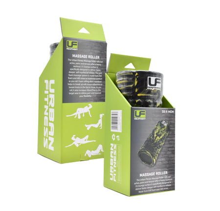 Two green Urban Fitness Massage Roller 33 x 14cm boxes—one features exercise illustrations for core stability, while the other displays a camouflage-patterned roller designed by Urban Fitness for effective muscle recovery.