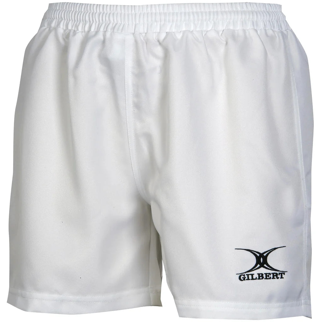 Introducing the Gilbert Saracen V3 Short – Women by Gilbert: lightweight white sports shorts featuring an elastic waistband and a black Gilbert logo on the lower right leg, designed for peak athletic performance as women’s rugby shorts.