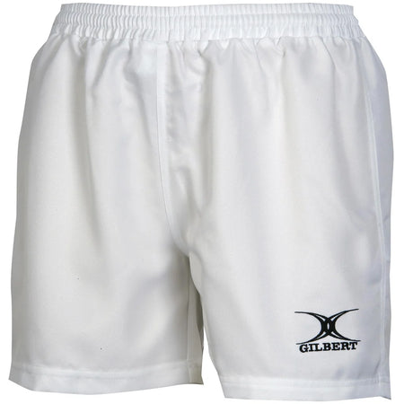 Introducing the Gilbert Saracen V3 Short – Women by Gilbert: lightweight white sports shorts featuring an elastic waistband and a black Gilbert logo on the lower right leg, designed for peak athletic performance as women’s rugby shorts.
