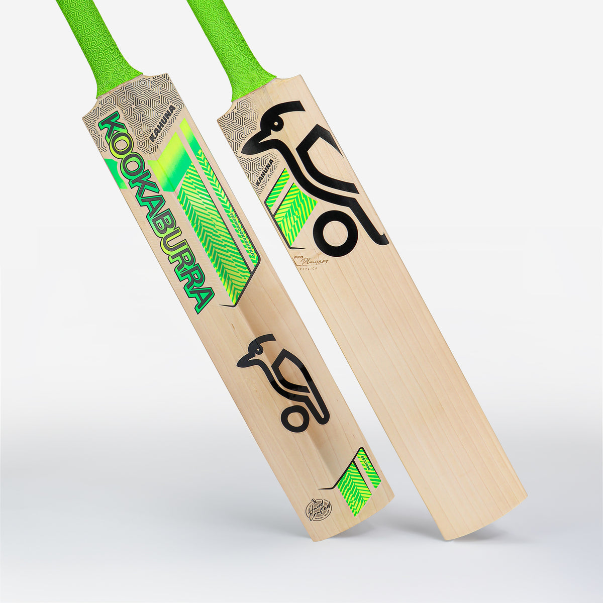 Two wooden cricket bats with bright green handles are shown. One is the Kookaburra Kahuna Jos Buttler Pro Players Replica Cricket Bat 2026, featuring the iconic Kookaburra logo and neon green graphics; the other displays a classic black bird logo.