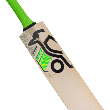 A close-up of the Kookaburra Kahuna Pro Players Edition Junior Cricket Bat 2026, featuring a green handle, black and neon green graphics with a stylized kangaroo, and crafted from Grade 1 English willow.